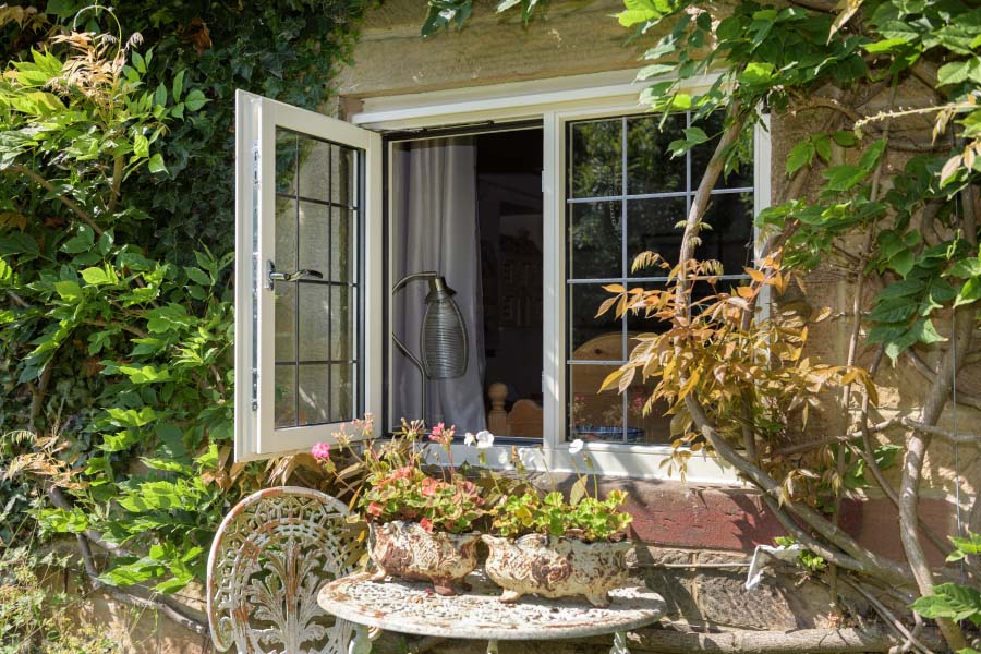 White Wooden Casement Window Exterior In Open Position