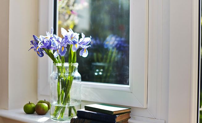 Close up of double glazed tilt and turn window in White UPVC from the Anglian tilt and turn window range