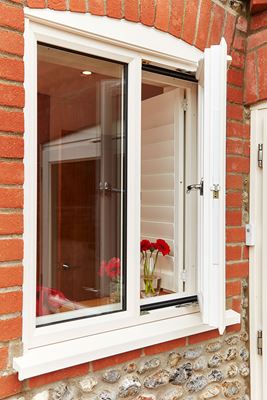 Open White UPVC casement window with chrome window handle from the Anglian UPVC windows range