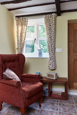 Interior view of Dual White and Sage Green UPVC double glazed casement windows with cottage bars from Anglian Home Improvements