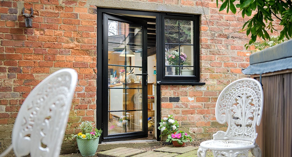 Black Aluminium Casement Window and back door with Georgian Glazing Bars in a Chequerboard Design