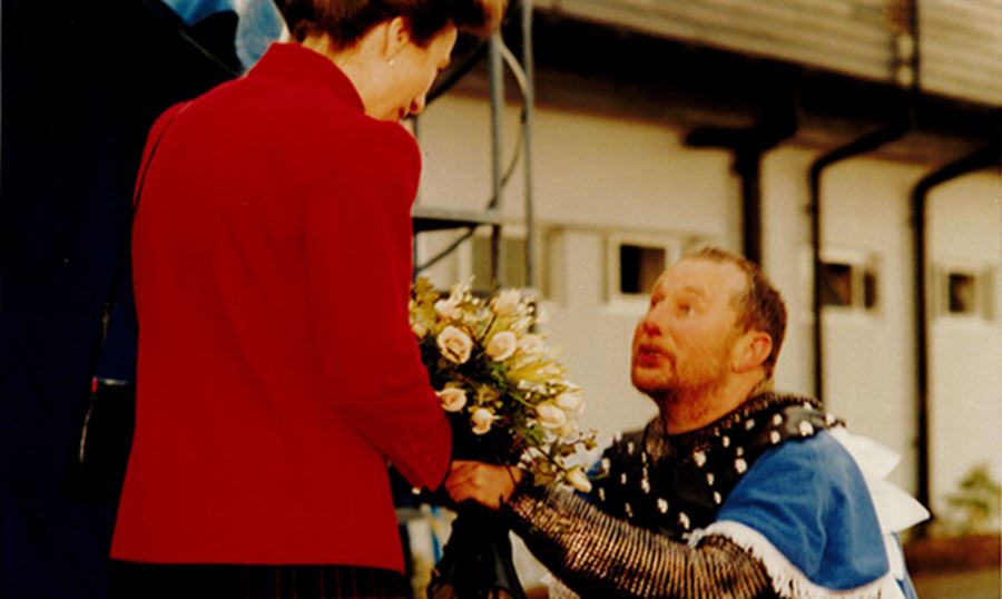 A Knight giving the Princess Royal a posy