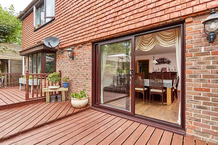 Dark woodgrain uPVC sliding patio door