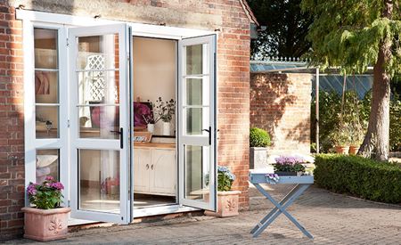 White uPVC French doors with Cottage Bars