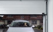 Remote operated steel sectional garage door