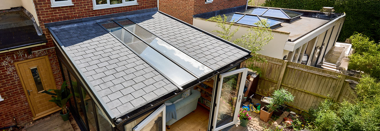Replica tiled roof installation on dual anthracote grey conservatory