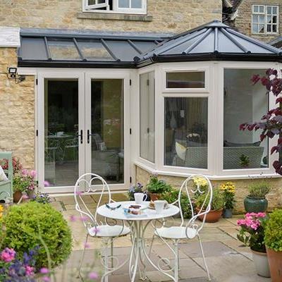 Solid panel extension with dual cream uPVC French doors