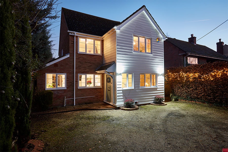White uPVC Bargeboard whole house evening view