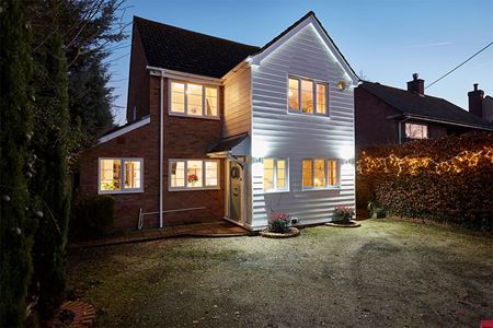 White uPVC Bargeboard whole house evening view