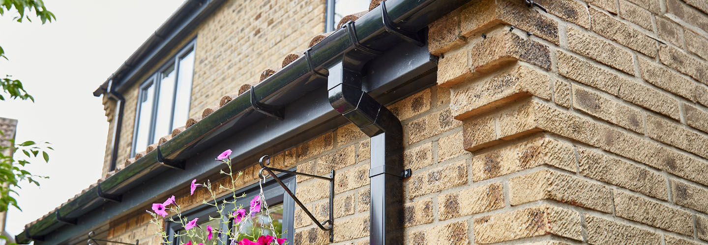 Black guttering and roofline banner