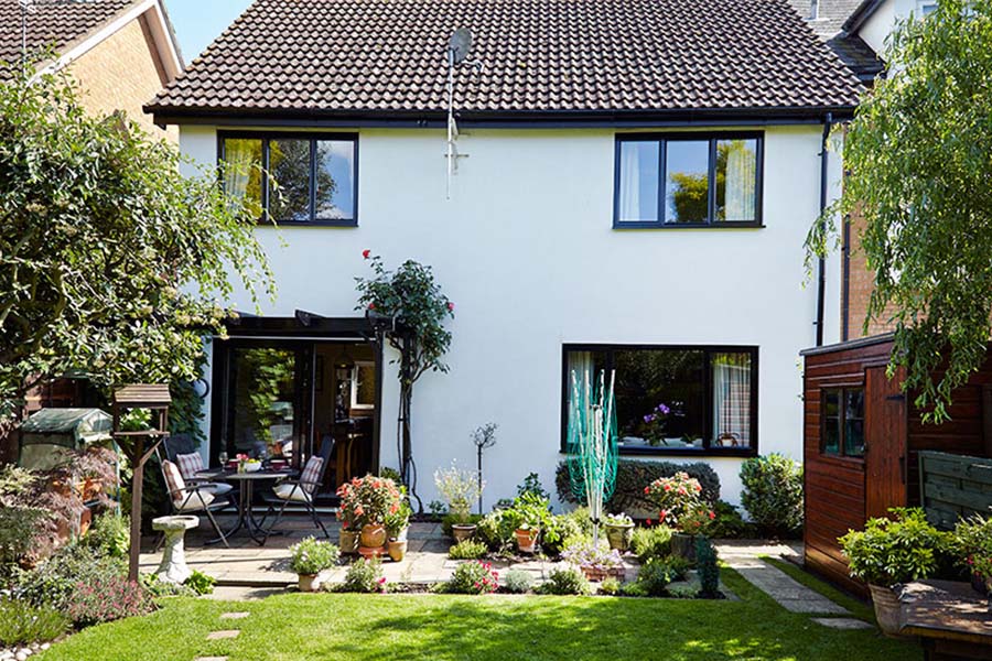 Whole house renovation of black uPVC guttering and downpipes from Anglian Home Improvements