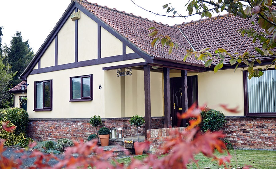 Whole house renovation of Brown uPVC guttering and downpipes from the Anglian rooftrim range