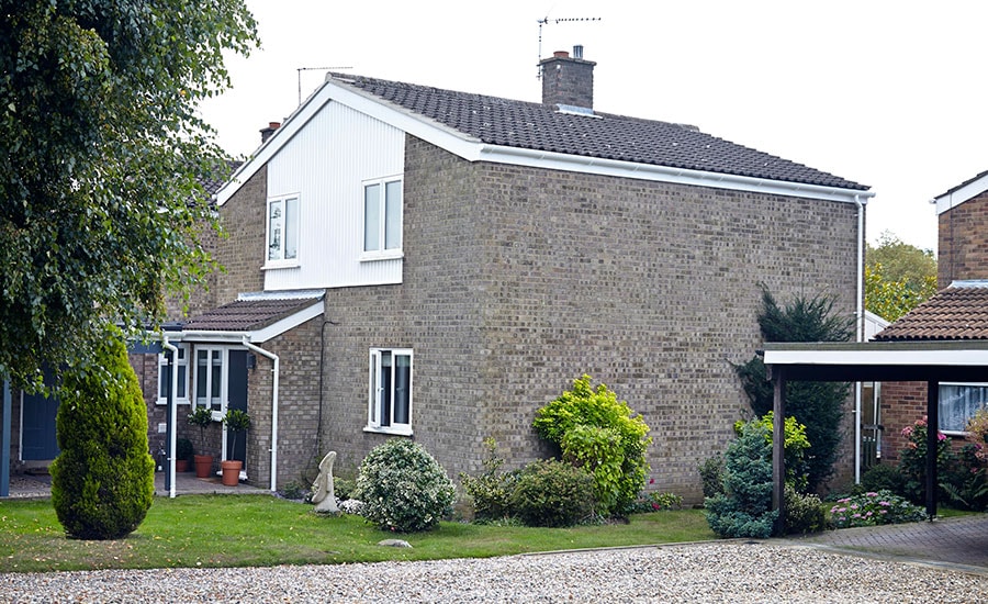 Whole house rooftrim renovation including White uPVC exterior cladding from the Anglian cladding range