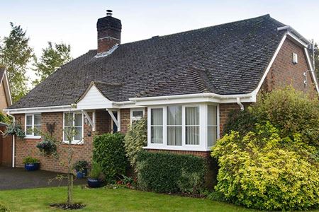 Bungalow featuring white uPVC windows, fascias, soffits and guttering
