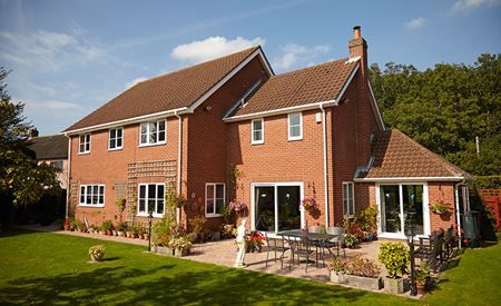 Grand detached property featuring white uPVC fasicas and guttering