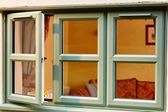 Dual_sage_green_upvc_casement_window