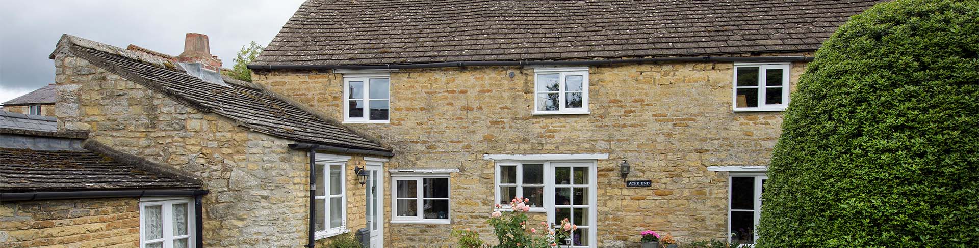 White wooden casement windows and back door whole house secondary banner