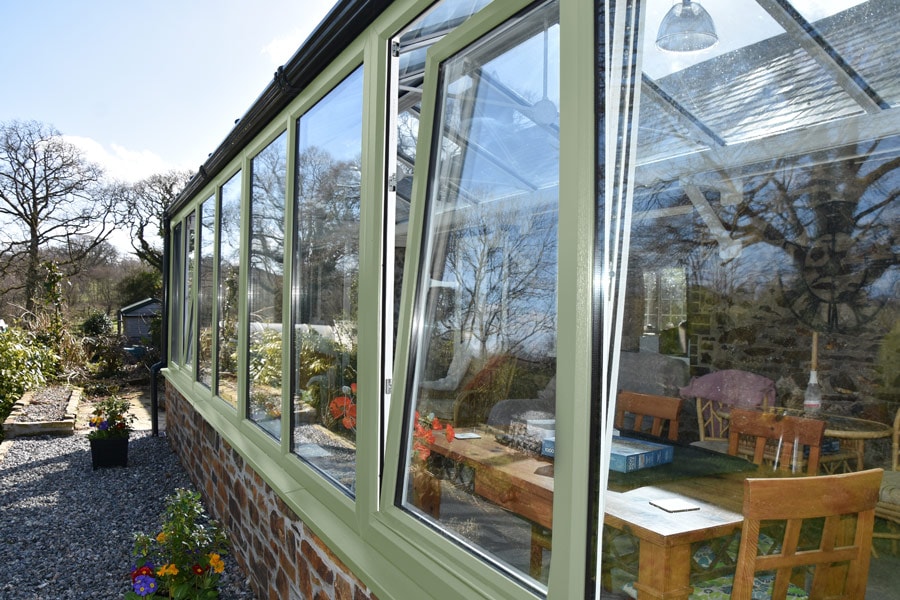 Dual sage green uPVC tilt and turn window